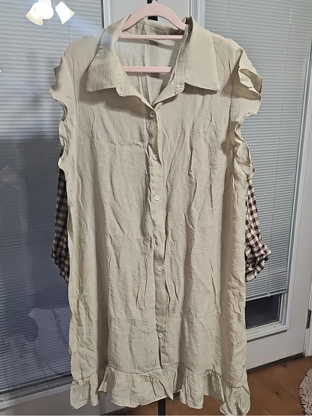 Sleeveless Cream Button-Front Ruffle Hem Dress
